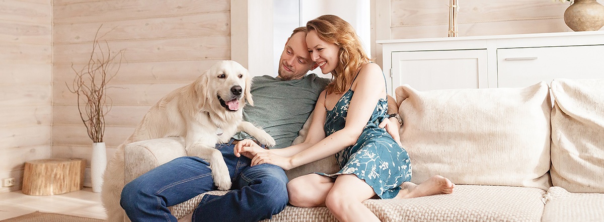 couple-on-couch-with-dog